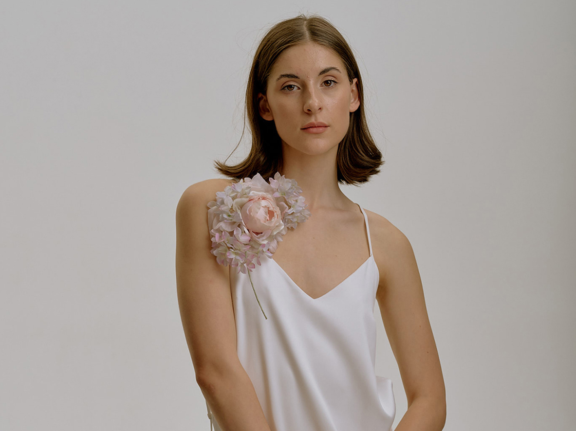 Hydrangea flowers and rose in corsage composition