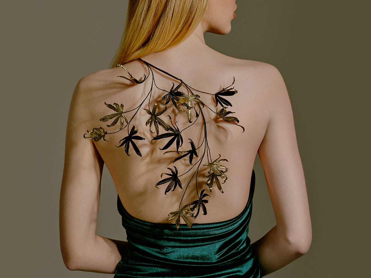 Delicate branch made of silk and gold taffeta